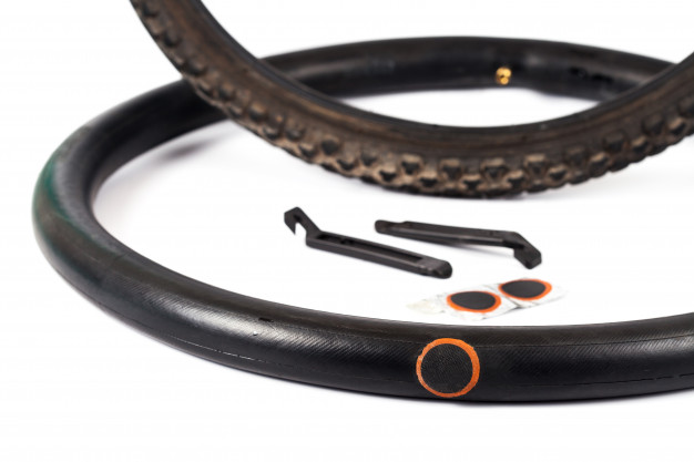Cover the holes by applying the bike tire patch kit