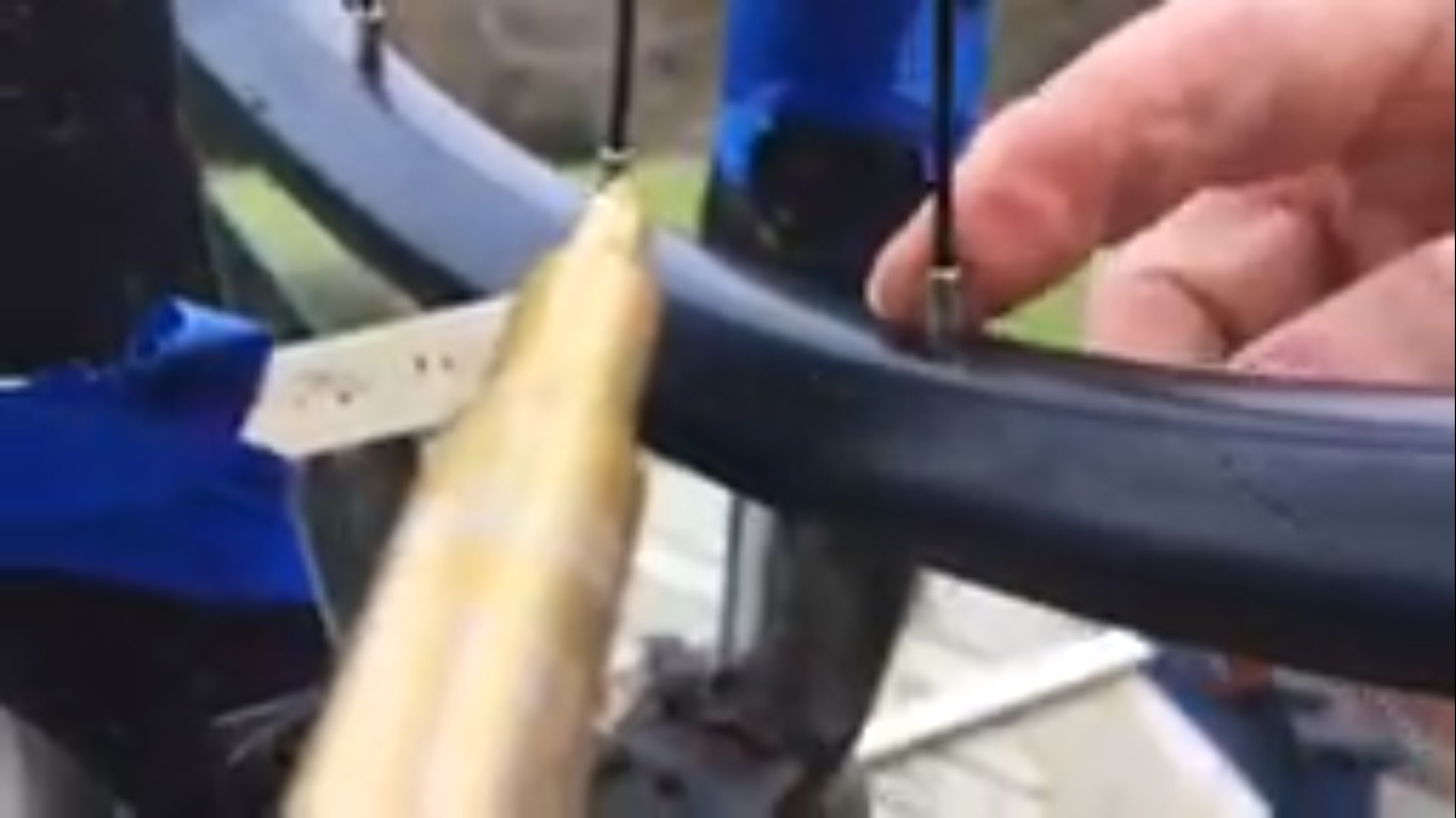 Straighten the rim of the bike